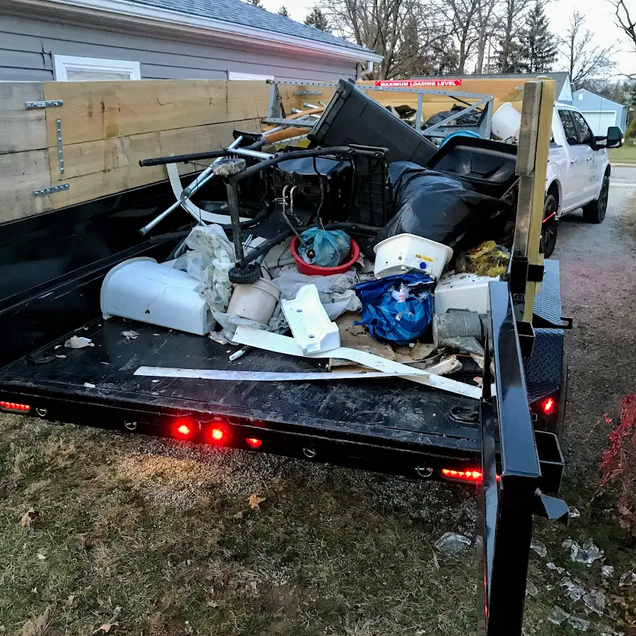 Roll-off dumpster delivered to a residential driveway in Hector